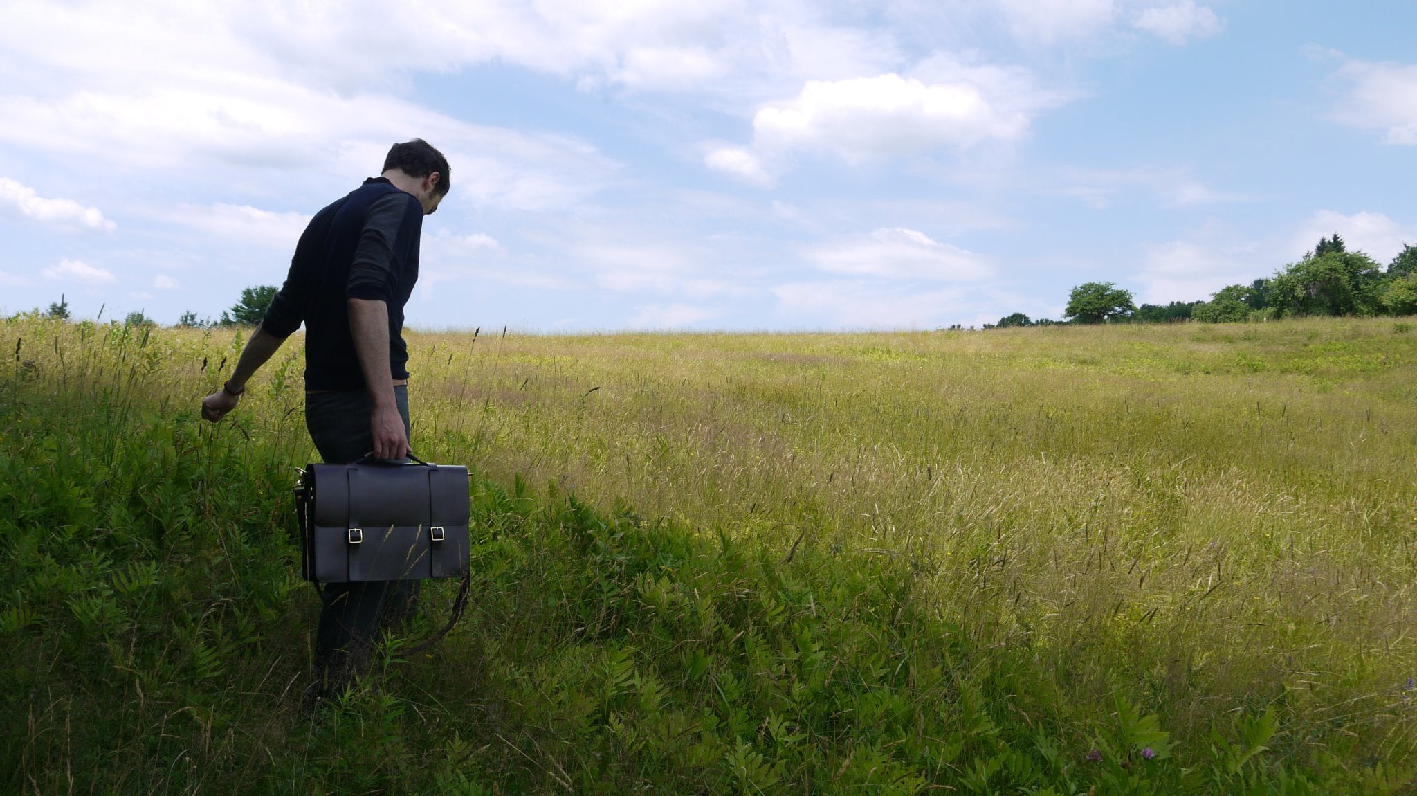 Basader Leather Briefcase in a green field