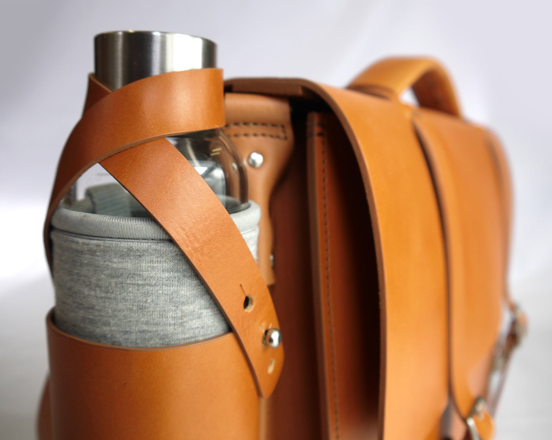 Messenger bags with water bottle holders on sale