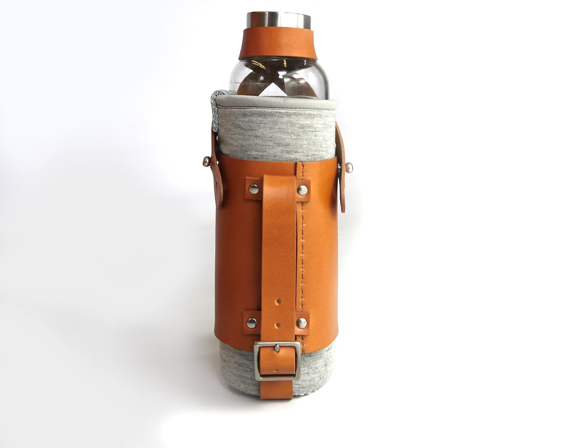 Basader bottle holder shown with a water bottle in english tan full grain leather