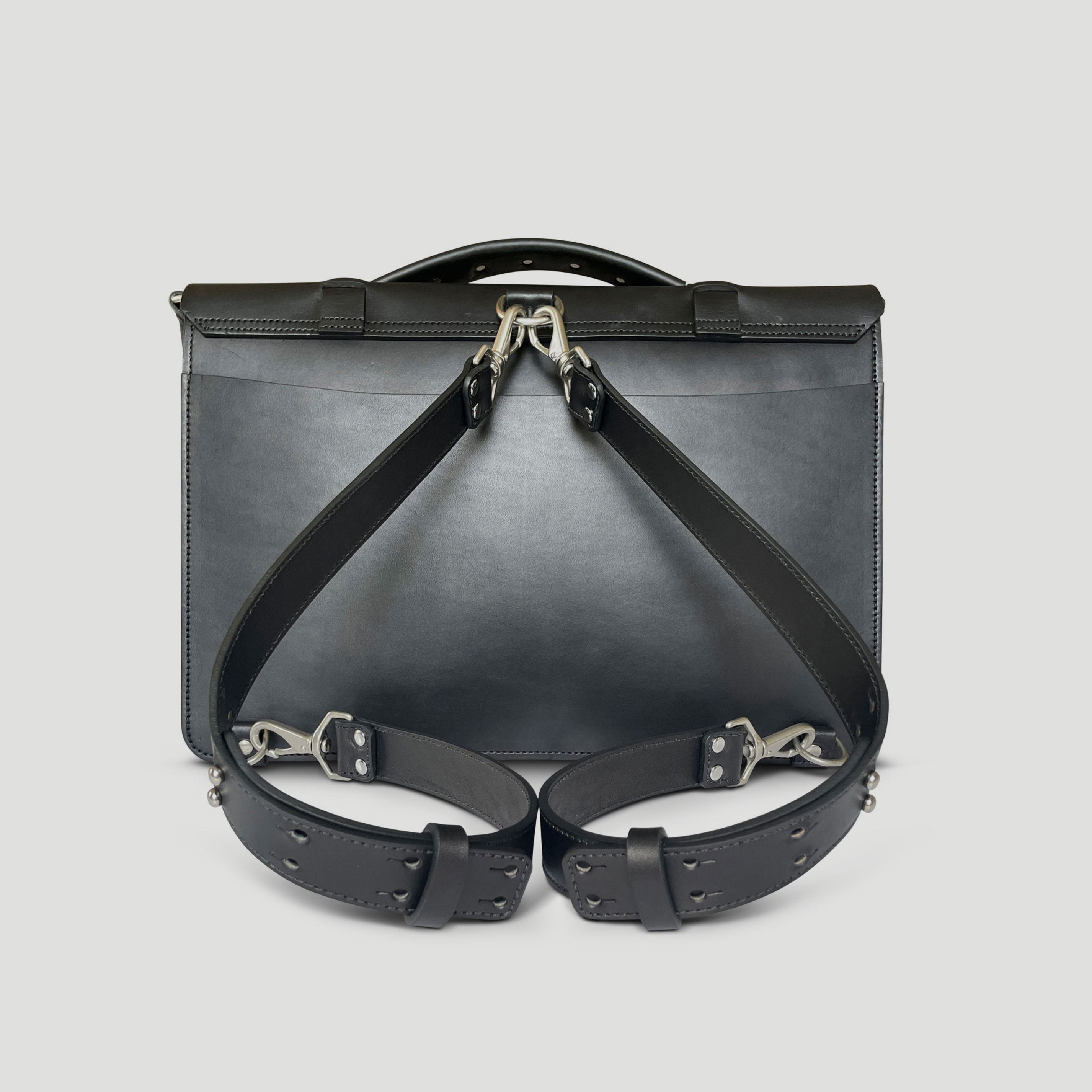 Satchel with backpack outlet straps